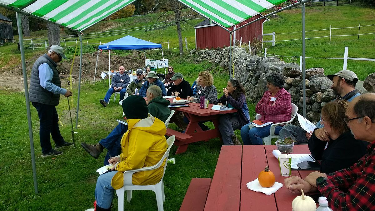 Professor Hashemi demonstrating the use of a soil corer