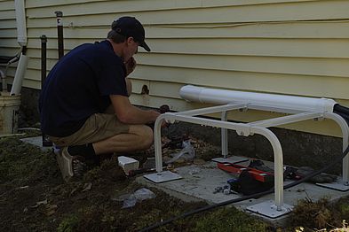 Orange Oil Company installing the new mini split heating and cooling system at Mount Grace headquarters.