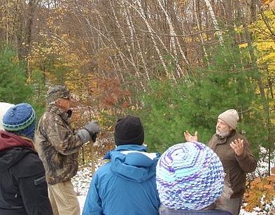 Dave Small leads a walk on the Haughton property.
