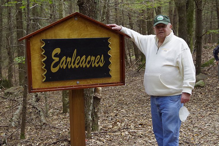 Larry Fitzmaurice at Earleacres sign